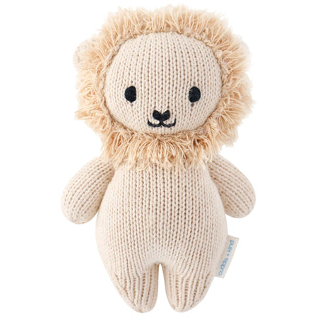 Knitted lion toy with a soft texture on a white background