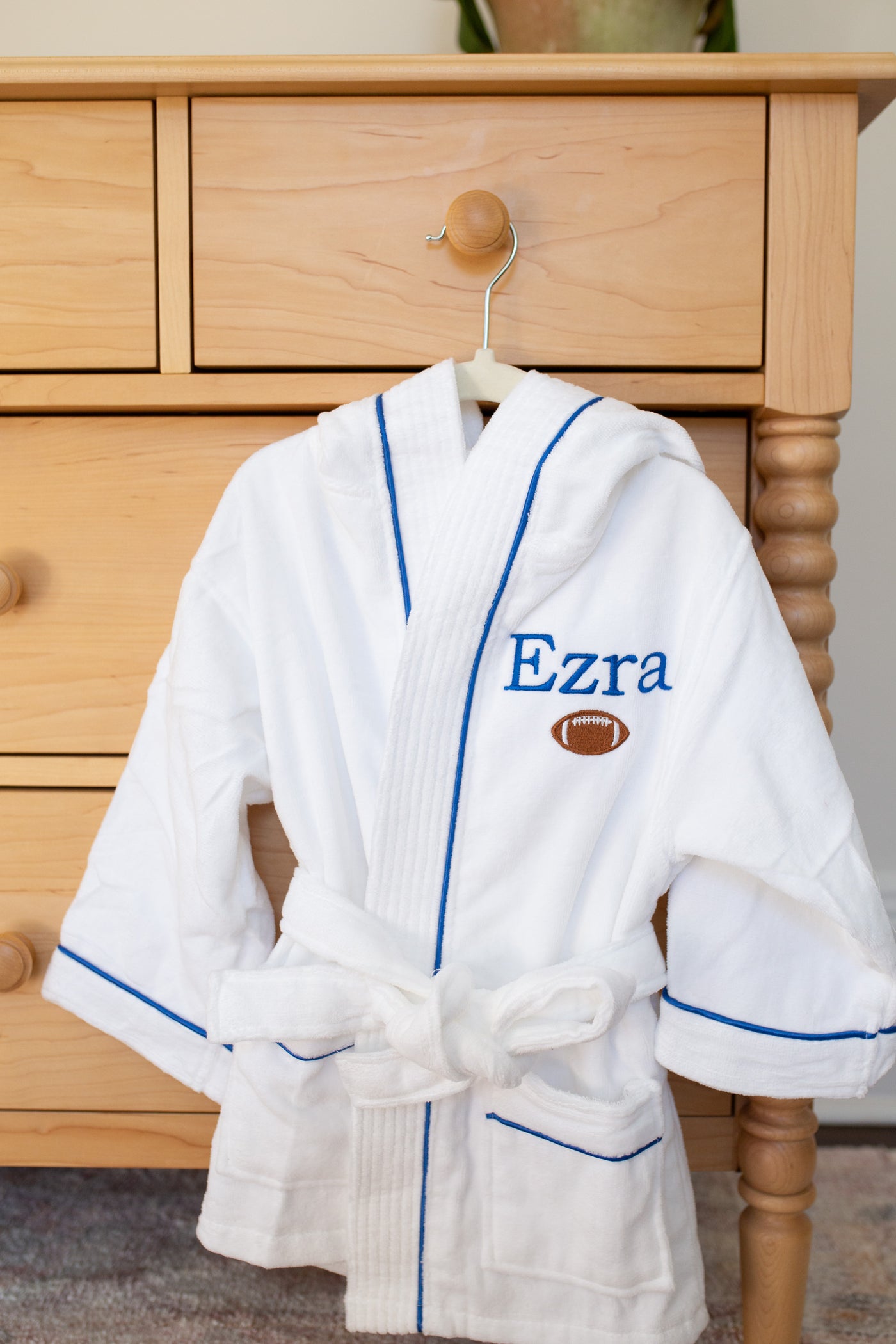 Image of monogrammed blue robe
