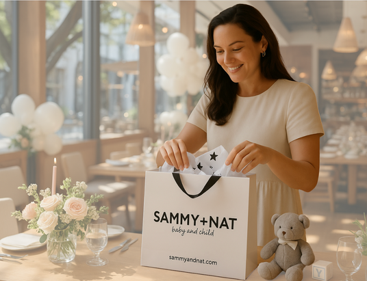 Image of woman at baby shower with her S+N gift