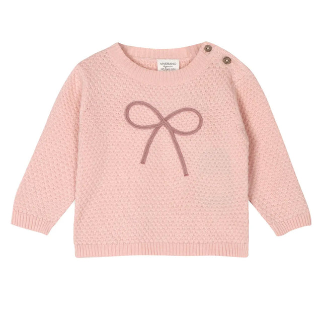 Pink knitted sweater with a bow design on a white background