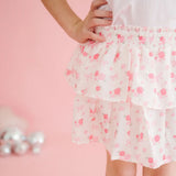 Floral skirt with pink flowers on a pink background
