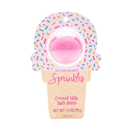 Pink bath bomb in a donut-shaped container with sprinkles on a white background