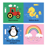 Children's educational pages of the book with colorful illustrations of a red tractor, yellow duck, black and white penguin, and rainbow.