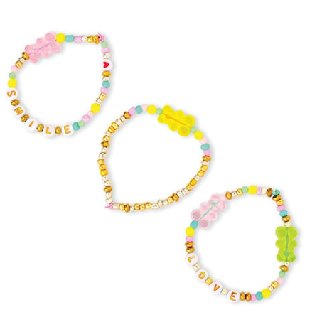 Set of colorful beaded hair accessories on a white background