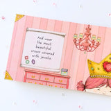 Illustrated book page with a princess theme, including a dresser, chandelier, and text about wearing a crown.
