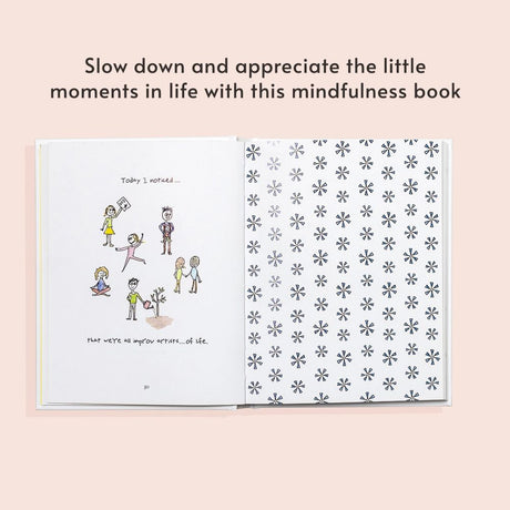 Open book with mindfulness illustrations and text on a light pink background
