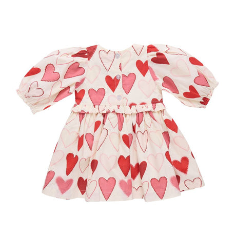 Dress with red and pink heart pattern on a white background
