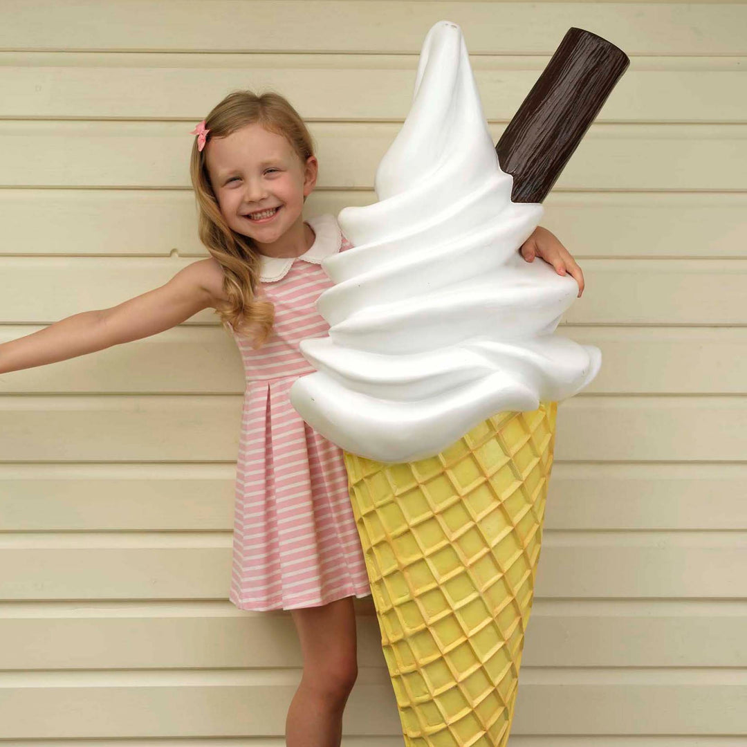 Breton Stripe Jersey Dress in Pink a girl holding a big ice cream