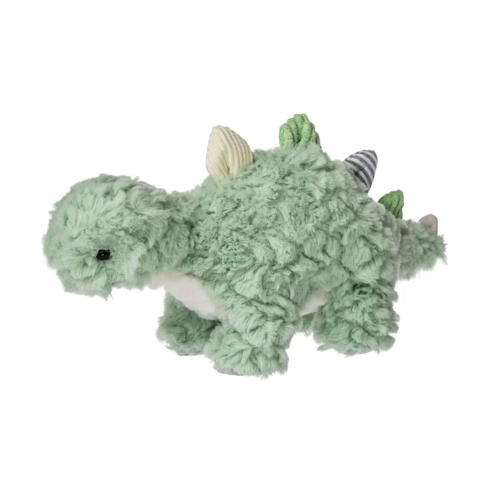 Green plush dragon toy on a white background