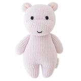 Knitted teddy bear toy on a white background