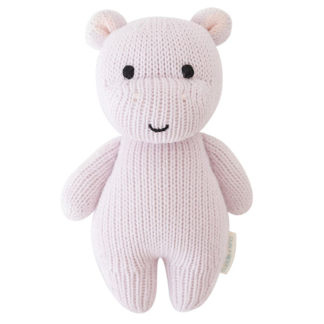 Knitted teddy bear toy on a white background