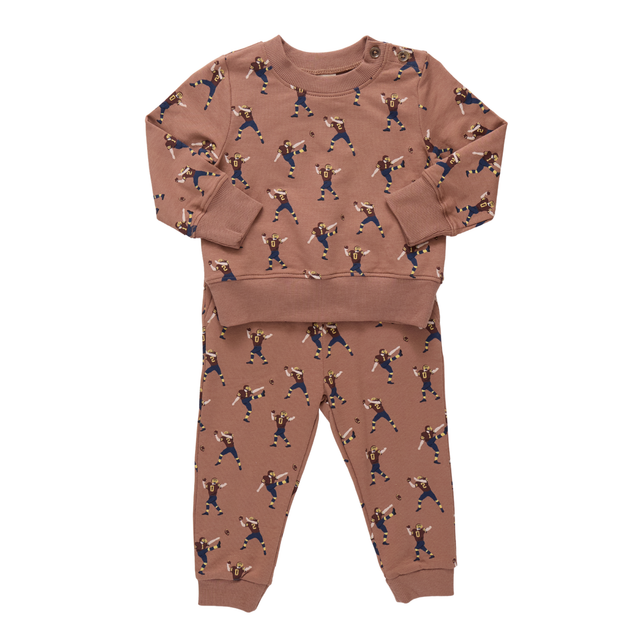 Brown set with football players as a pattern all over