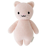 Knitted pink cat plush toy on a white background