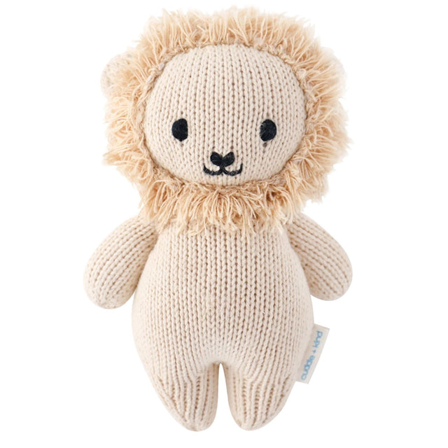 Knitted lion toy with a soft texture on a white background
