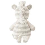 Knitted toy giraffe on a white background