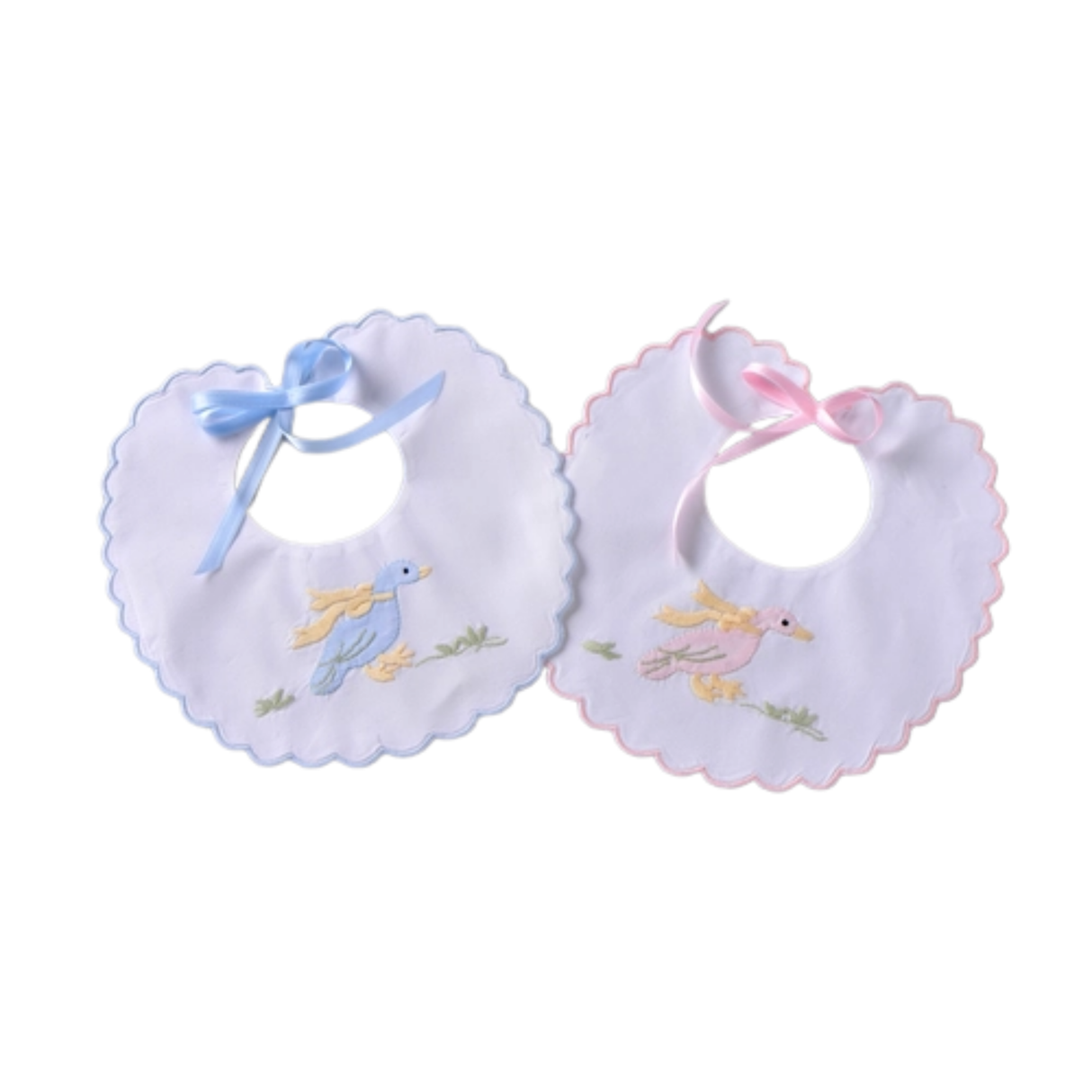 Two bibs with blue and pink trimming on white background