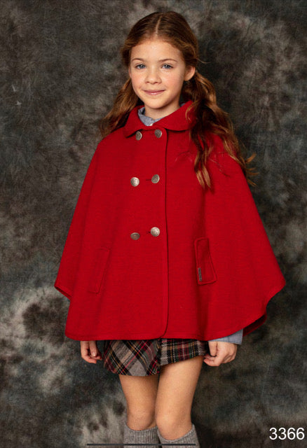 girl wearing red wool cape