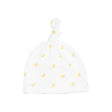 White baby hat with yellow duck pattern on a white background