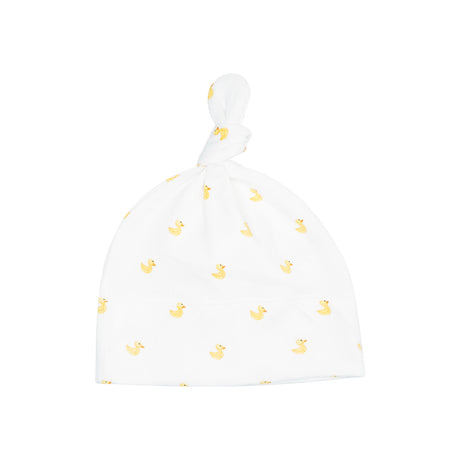 White baby hat with yellow duck pattern on a white background