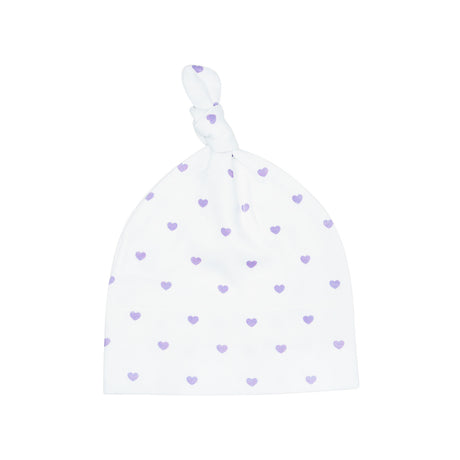 White baby hat with purple heart patterns on a white background