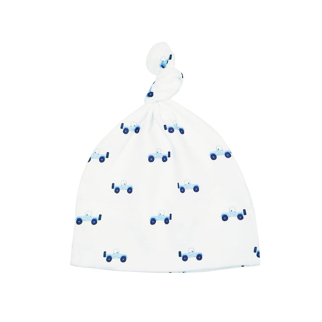 White baby hat with blue car pattern on a white background