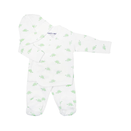 White baby onesie with green pattern on a white background