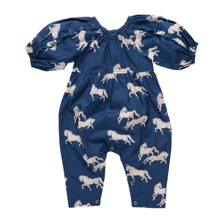 Blue romper with horse pattern on a white background