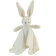 Knitted bunny toy with a white blanket on a white background
