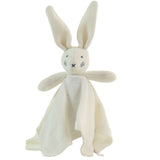 Knitted bunny toy with a white blanket on a white background