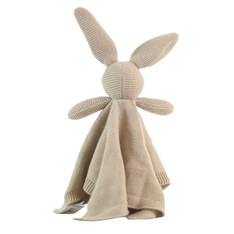 Knitted bunny toy with a blanket on a white background
