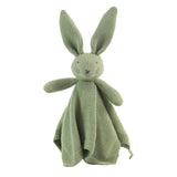 Green knitted bunny toy on a white background