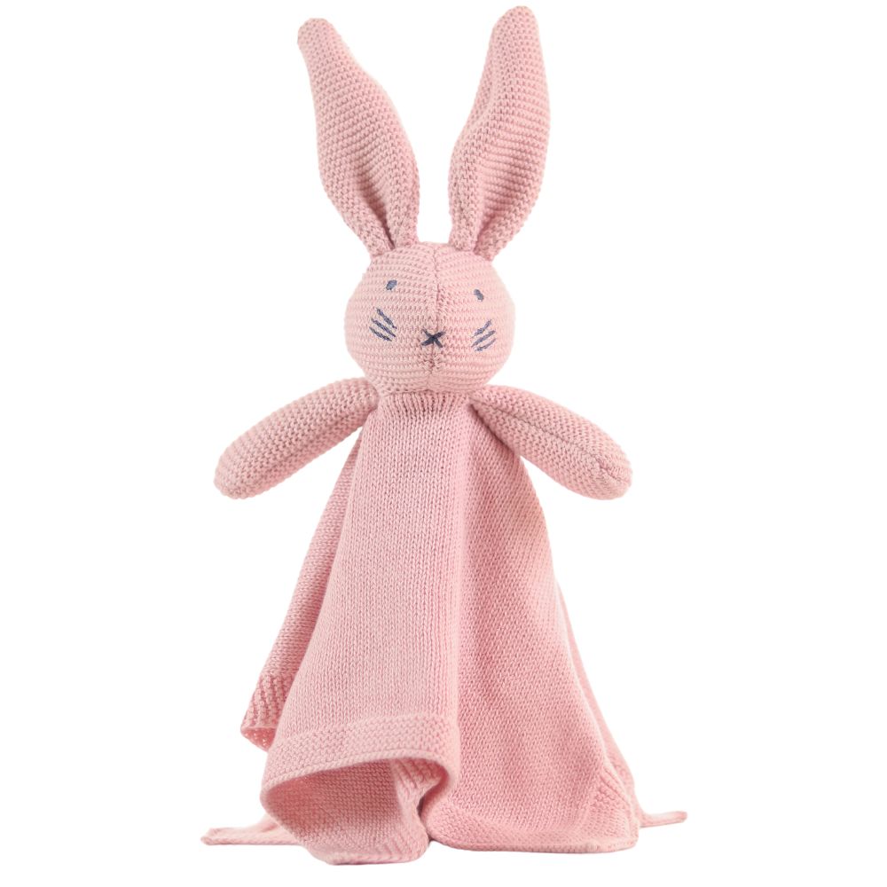 Pink knitted bunny toy with a blanket on a white background
