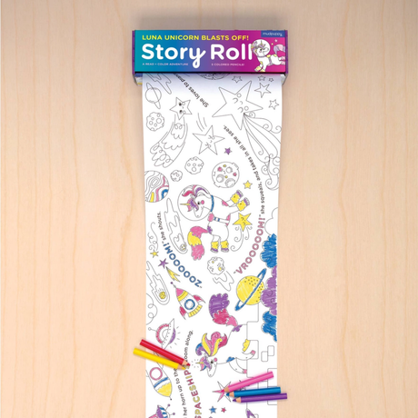 Story roll with unicorn design on a wooden surface