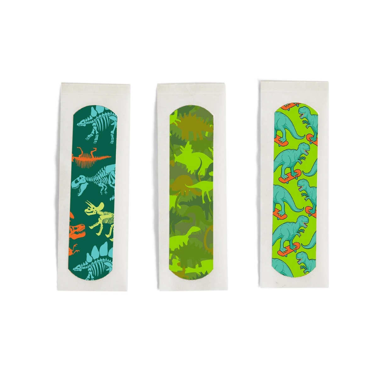 Three bandage packages with dinosaur patterns on a white background