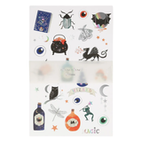 Sheet of temporary tattoos with magical designs on a white background