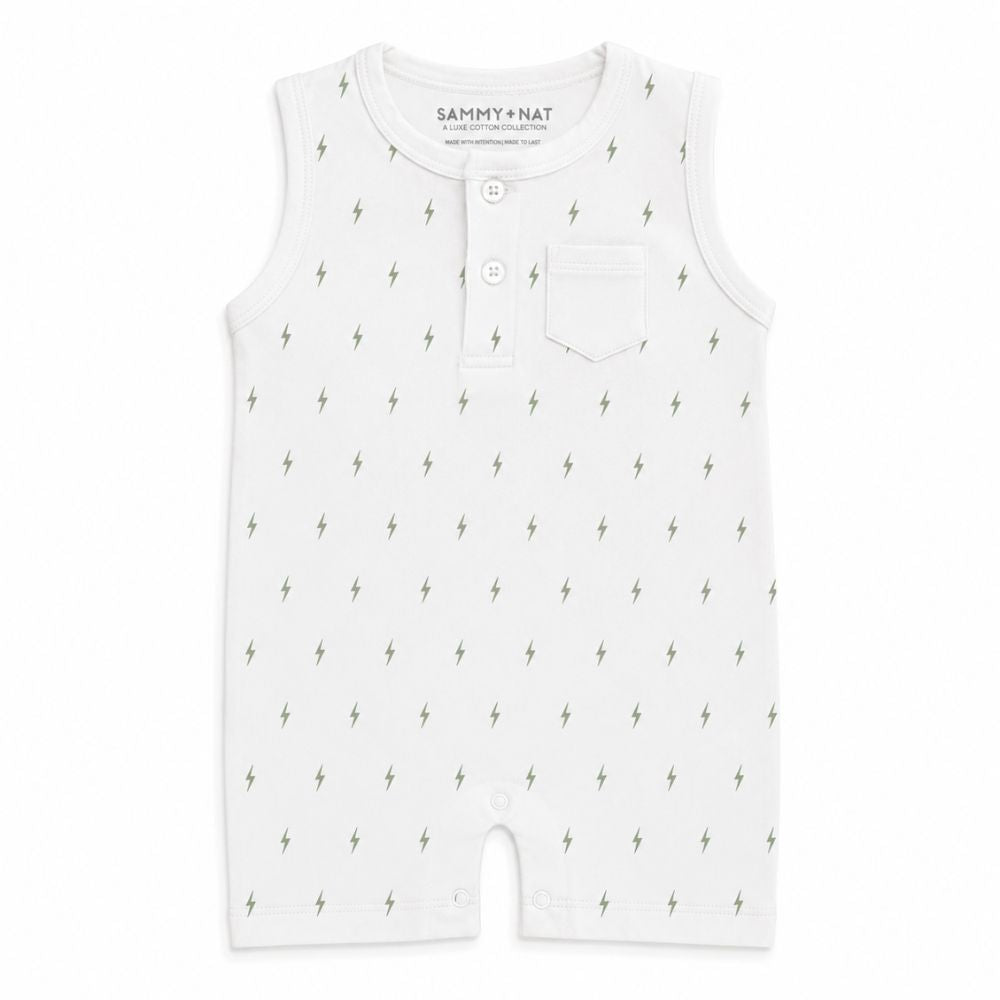 White baby romper with lightning bolt pattern on a white background