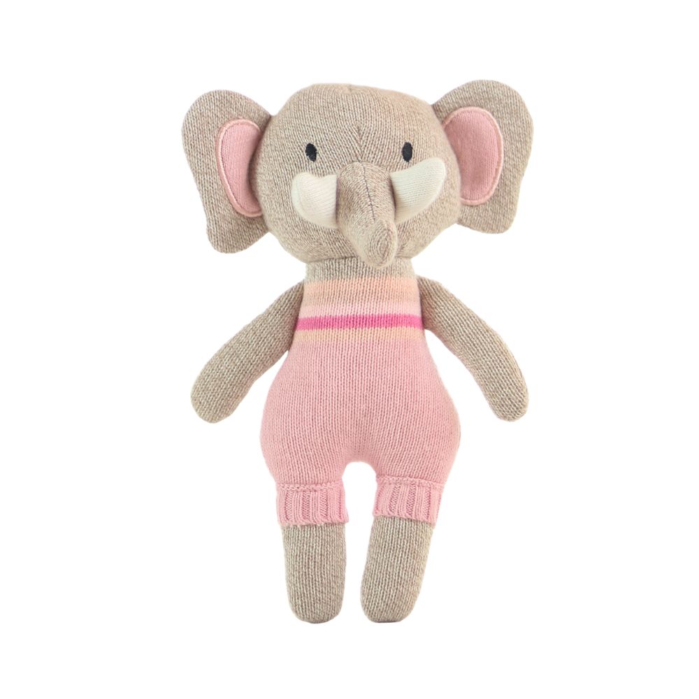 Knitted toy elephant in pink outfit on a white background