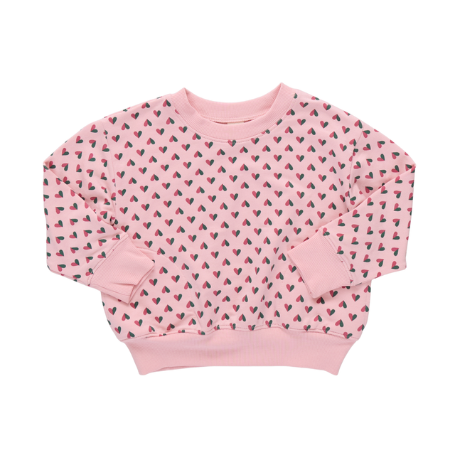 Pink kids sweatshirt with hearts on a white background