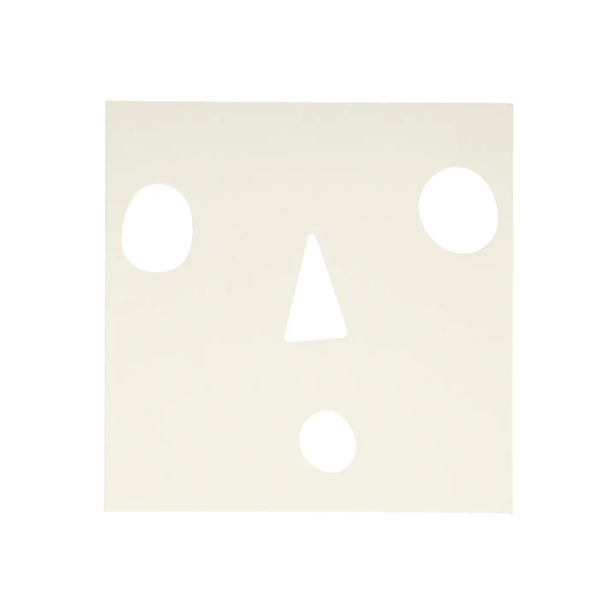 Beige wall plate with three white circular cutouts