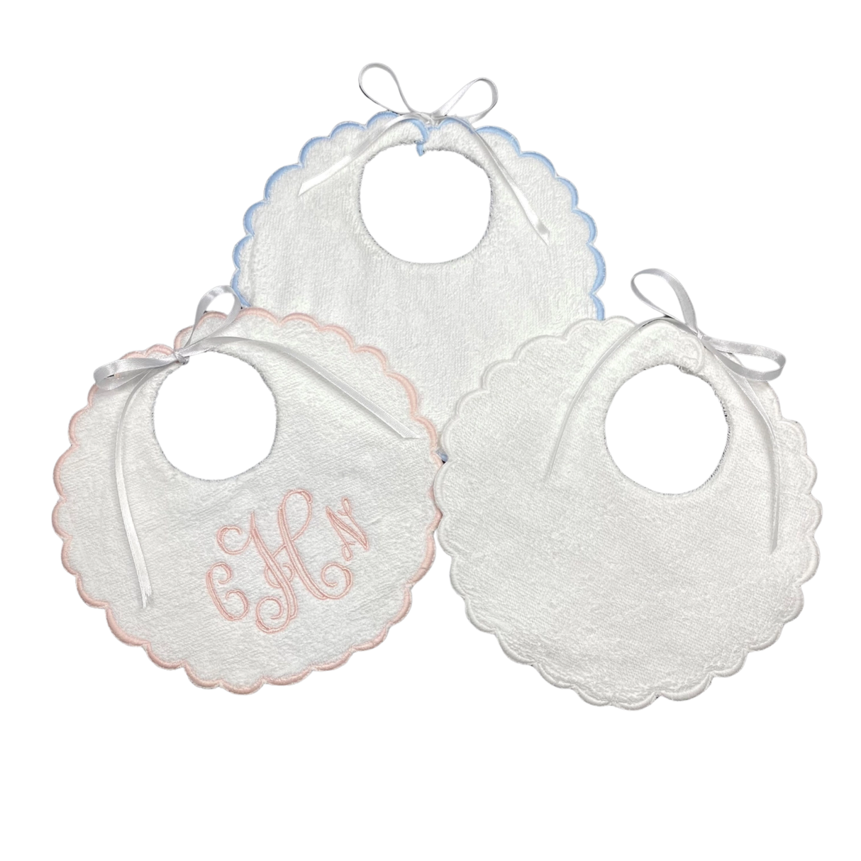 Three white bibs on white background