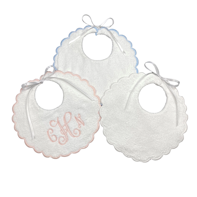 Three white bibs on white background