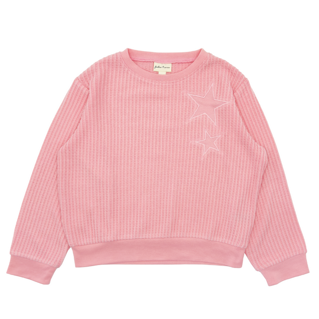 pink thermal top with starts on the left shoulder on a white background