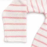 Close-up of a white knitted scarf with pink stripes on a white background