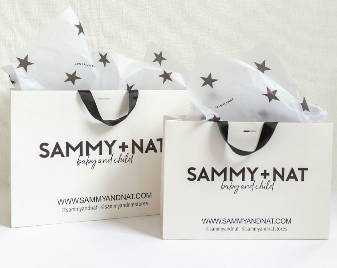 two S+N Shopping bags with tissue paper