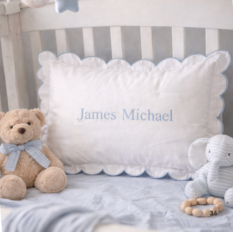 Scalloped Pillow in a Crib