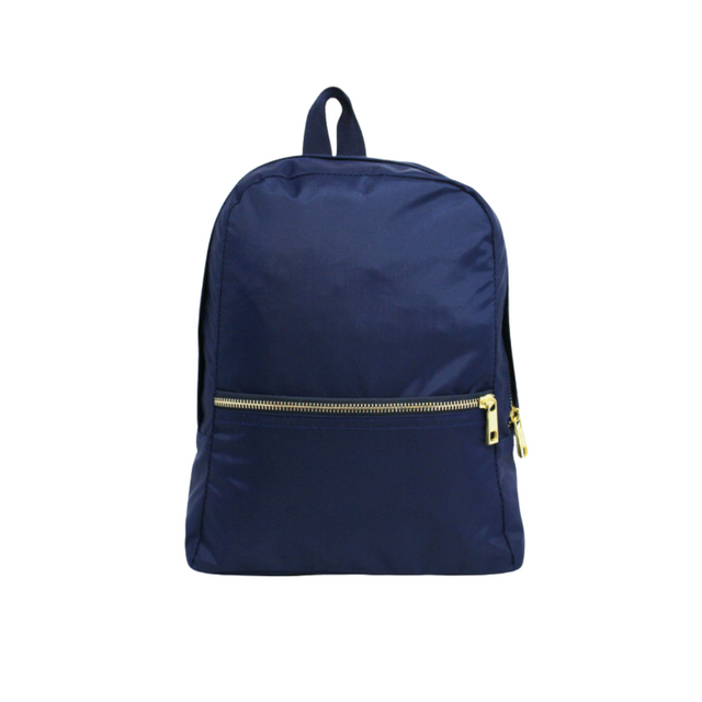 Navy backpack with gold zipper on white background