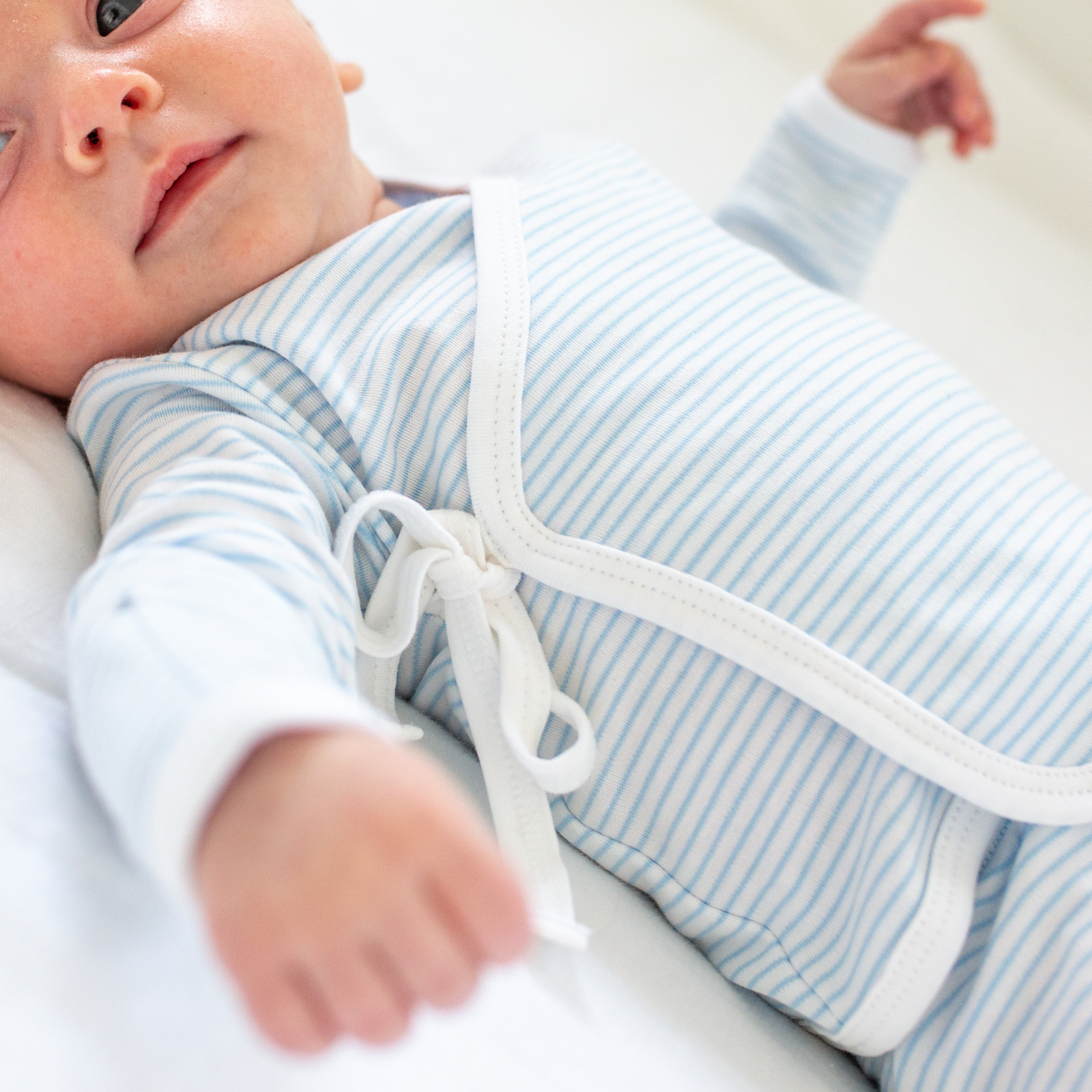 a baby wearing Classic Stripe Take Me Home Set in Light Blue