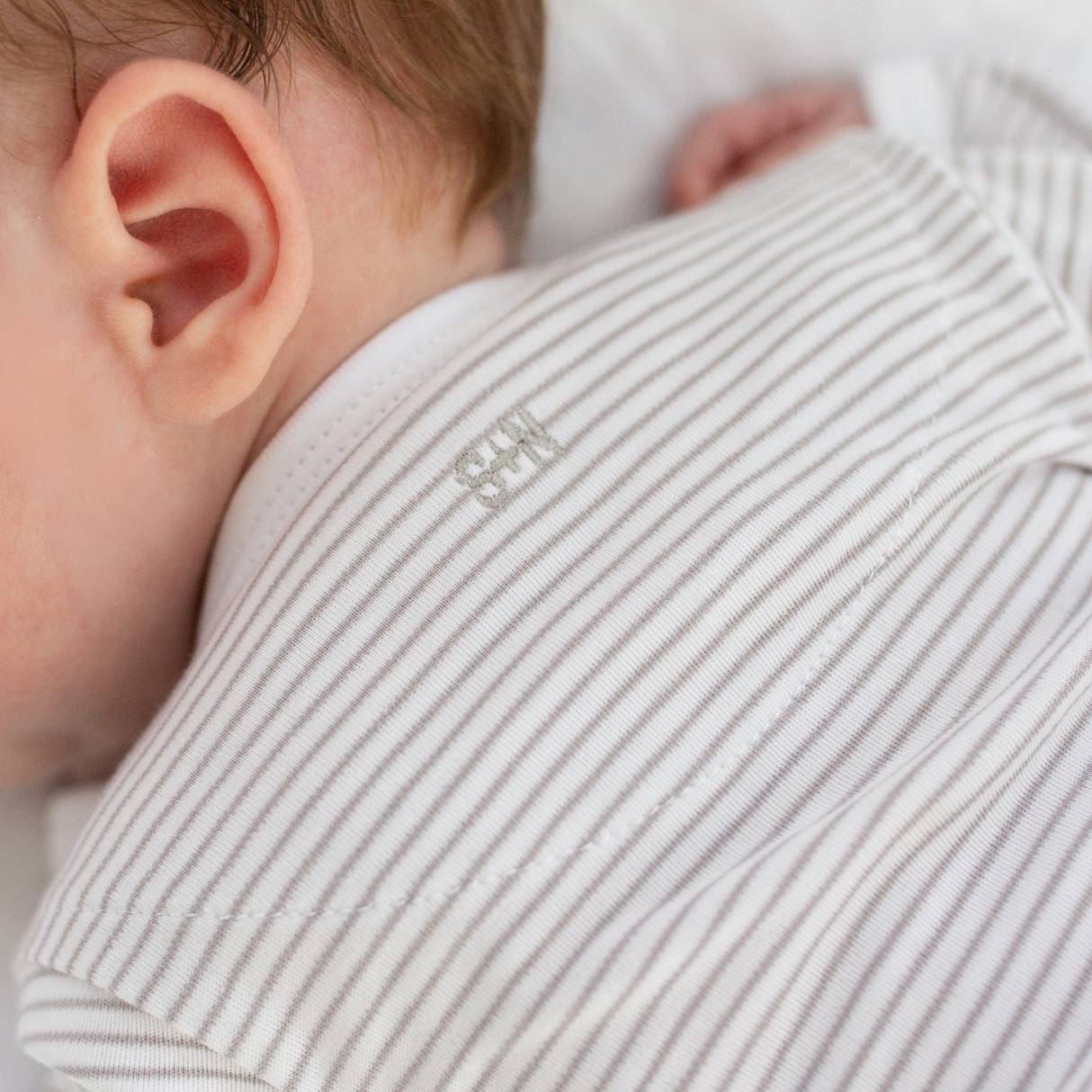 a baby wearing Classic Stripe Take Me Home Set in Grey
