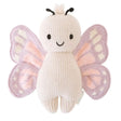 Knitted butterfly toy with pink and purple wings on a white background