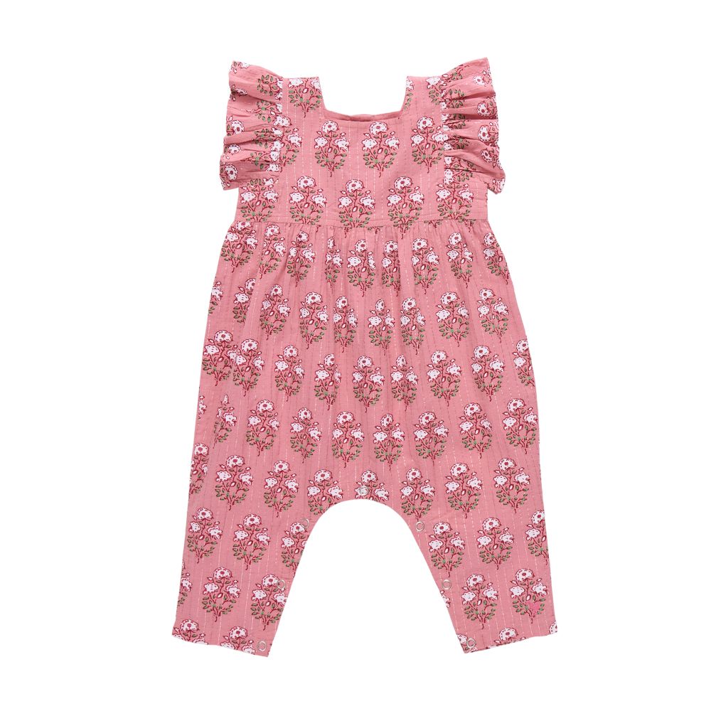 Pink floral baby romper on a white background